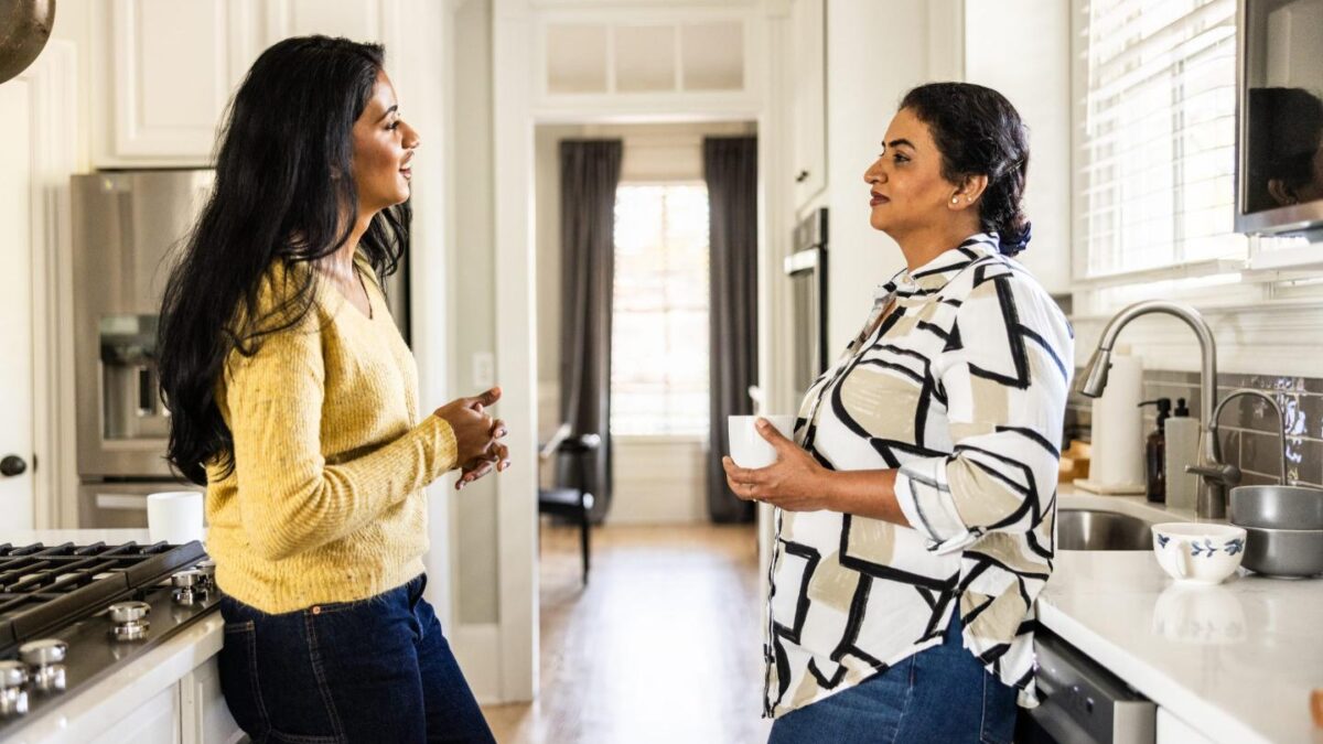 Millennial with her mother in family house