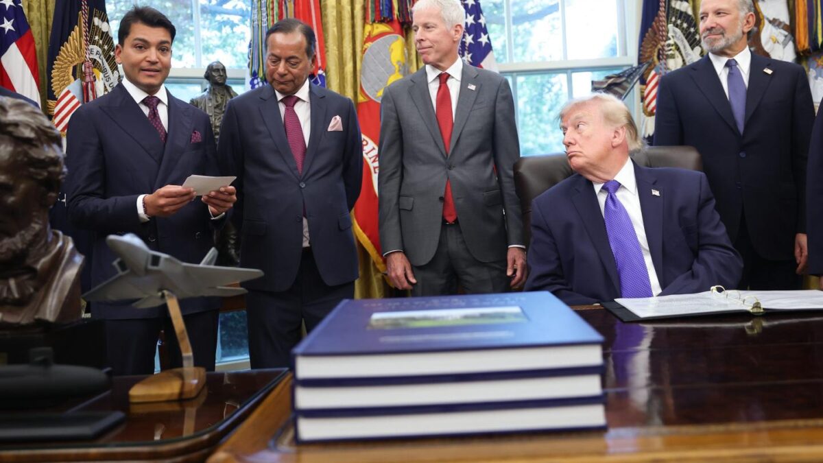 U.S. President Donald Trump speaks with Rewant Ruia (L), Chairman of Mesabi Metallics, and Ravi Ruia (2nd L), Board Member of Mesabi Metallics and Director of Essar Capital, while making an announcement in the Oval Office at the White House on September 28, 2026 in Washington, DC. Trump announced plans that a new $15 billion steel plant will be built in eastern Iowa by Mesabi Metallics and is projected to be one of the largest in the United States.